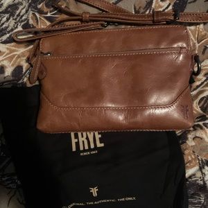 Frye crossbody wristlet in cognac.